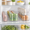 Clear double-layer can organisation tray holding canned drinks in a refrigerator