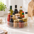 35 cm clear Lazy Susan turntable holding bottles and condiment jars on a kitchen counter