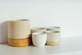 Open pantry with matched glass jars and bamboo lids
