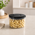 Compact 500ml push top pantry container with black lid on a neutral kitchen counter